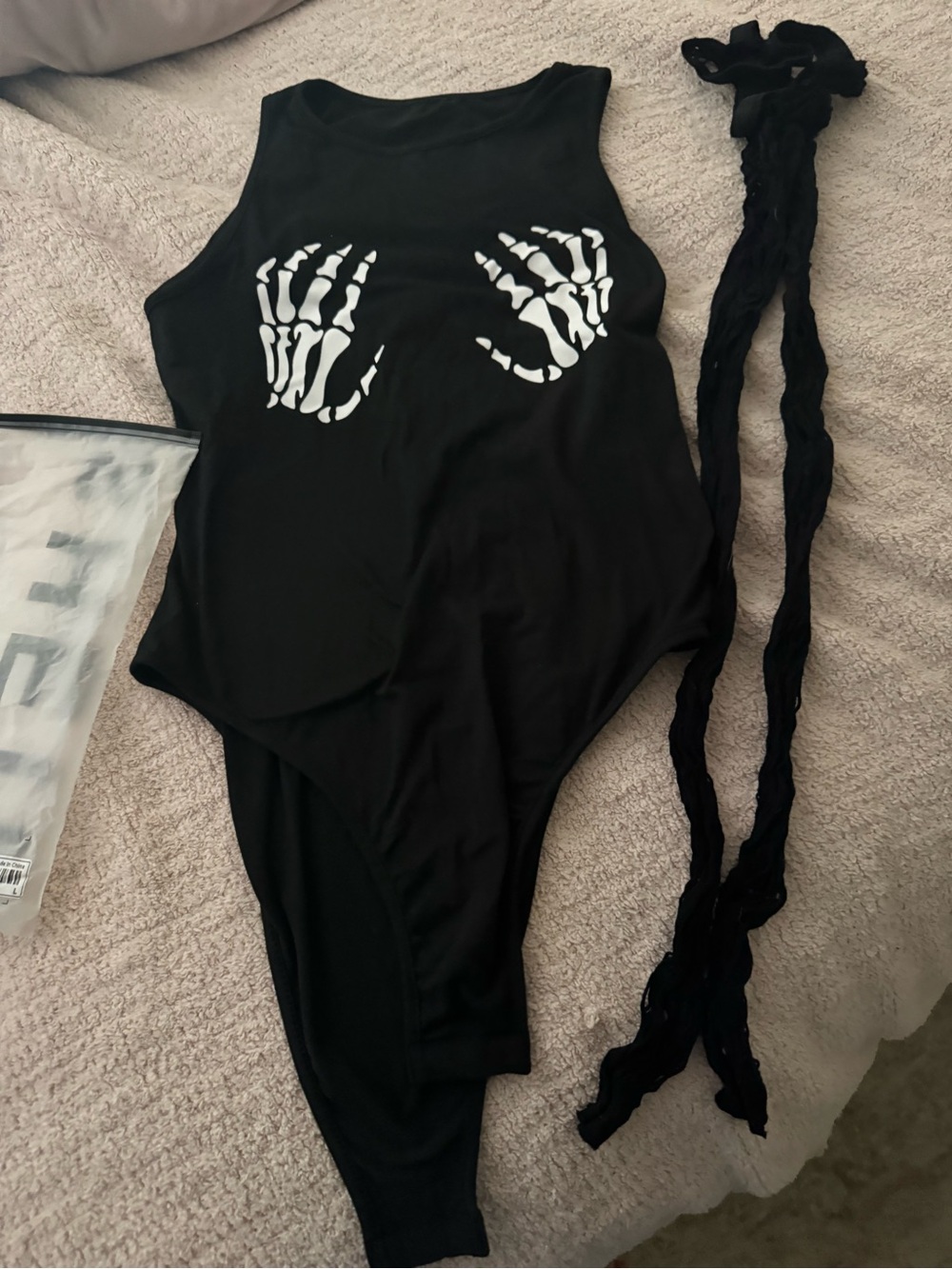 SHEIN Black One-Piece with White Skeleton Hand Graphic and fish net hose
